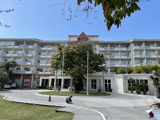 This is our hotel where we are staying. The guy in the road is re-painting arrows that direct traffic.