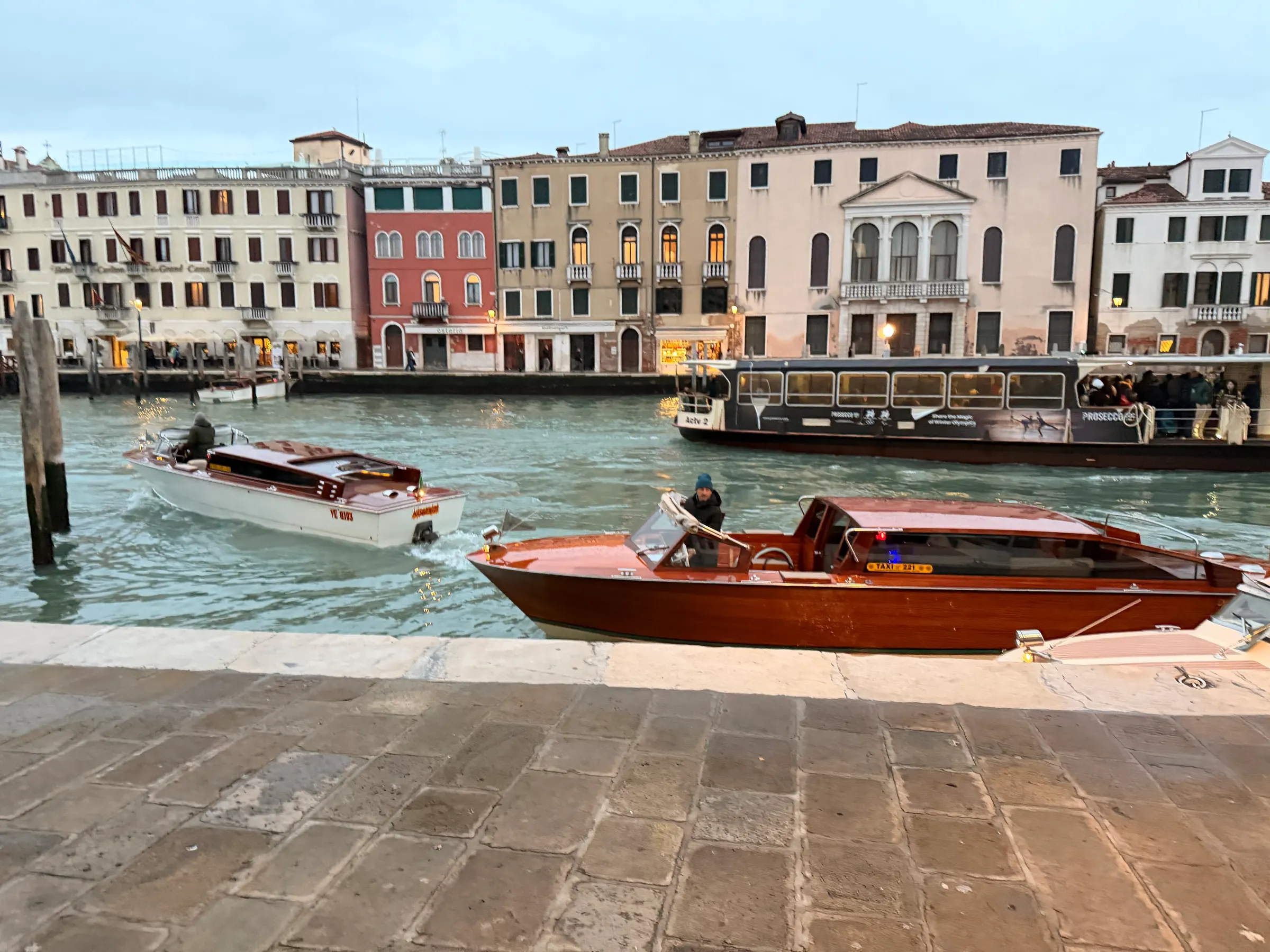This is a private water taxi. You see lots of these running around. They are not the public water ferries that we used all day today.