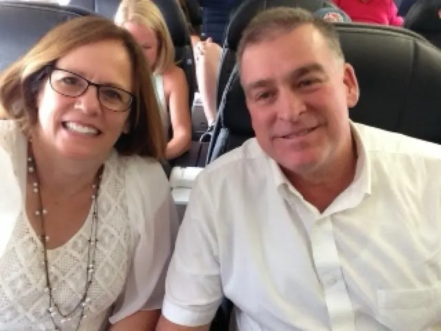 This is us after we got upgraded to first class from Houston to oklahoma City. Happy people.