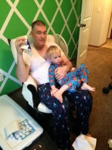 Tim and Lucas in his new bedroom. Cassidy and Mike did a great job painting it.