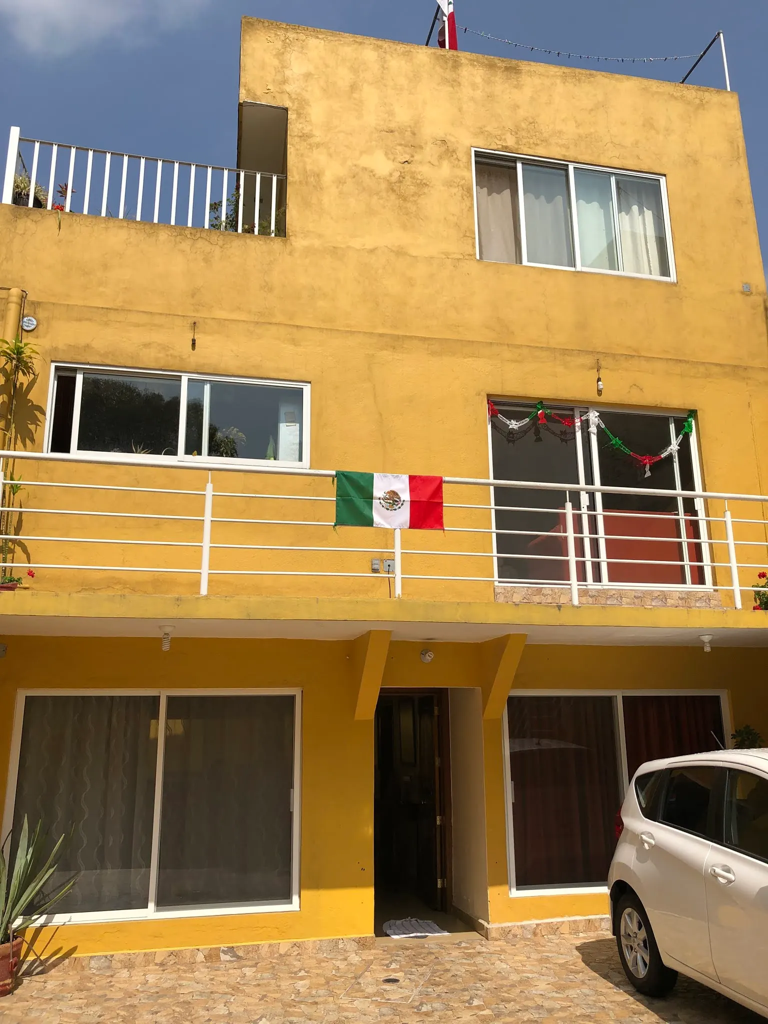 Mexican flags are flown everywhere here. This is our hosts place above our apartment.
