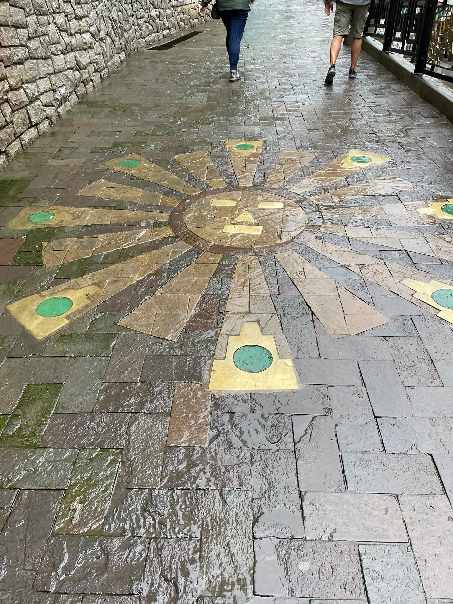 They have lots of symbols in the sidewalks here in MP Pueblo. This obviously represents the sun.