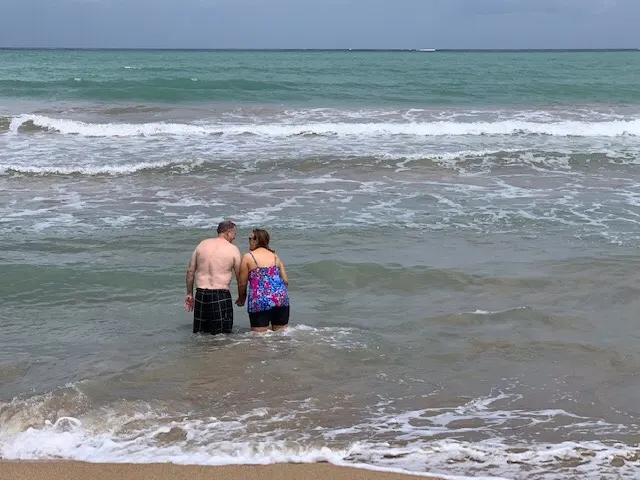 Two people in love with each other enjoying the ocean....