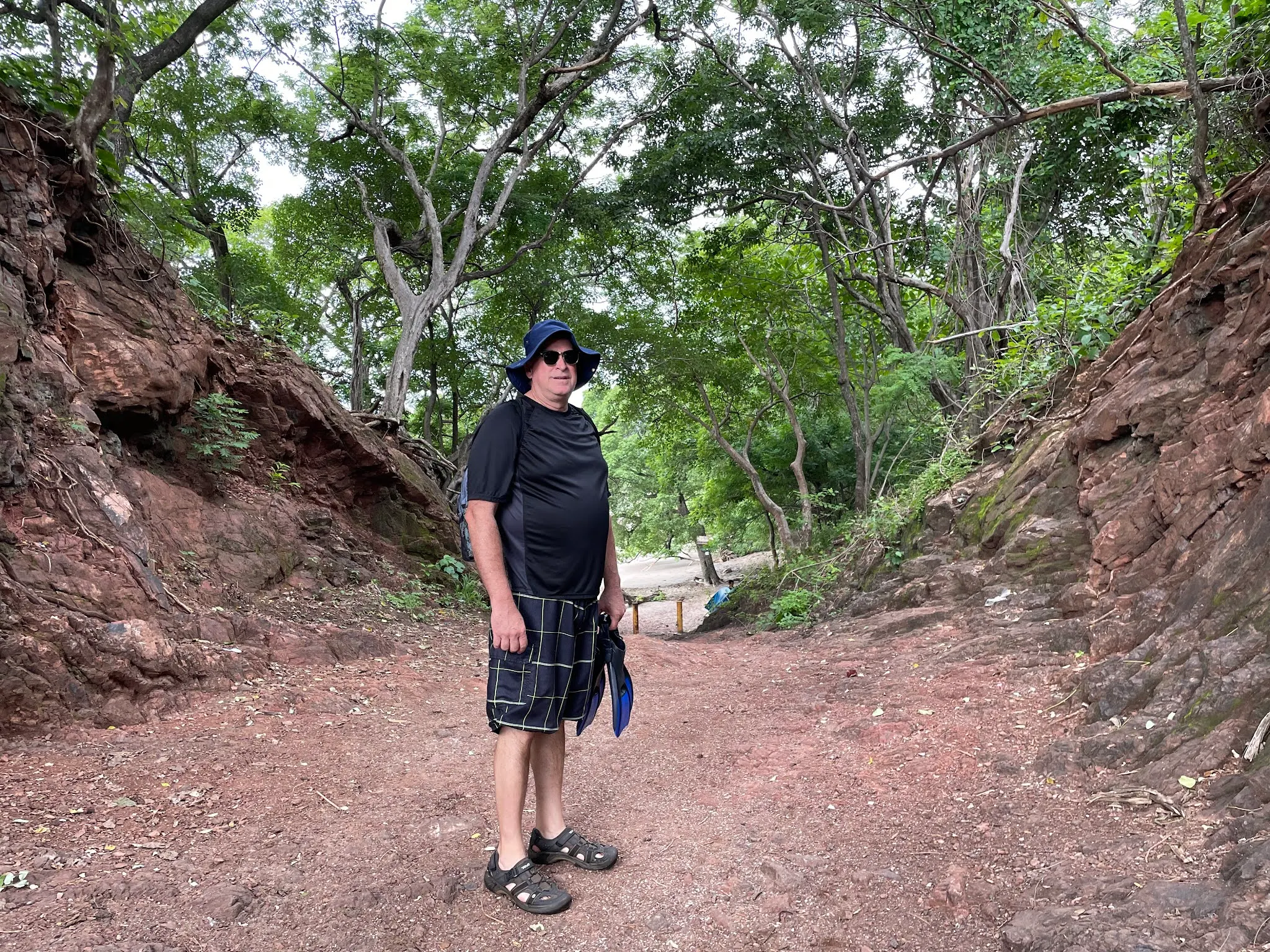 To get to Playa Conchal from Playa Brasilito, we had to go over this little rise between the beaches. There we were greeted by people wanting to rent us seats and beach covers…which we turned down.