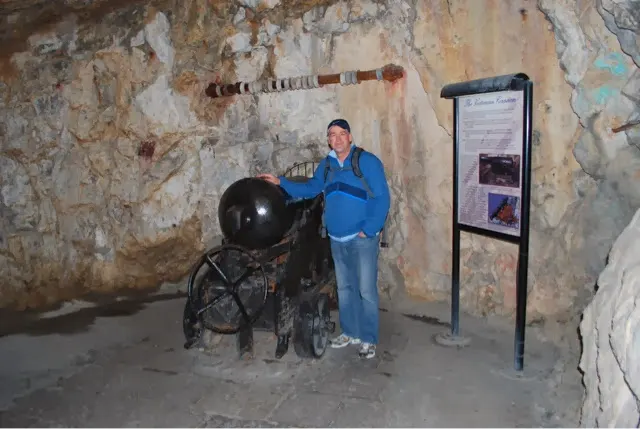 A cannon pointing out of the rock. We are inside one of the many tunnels...