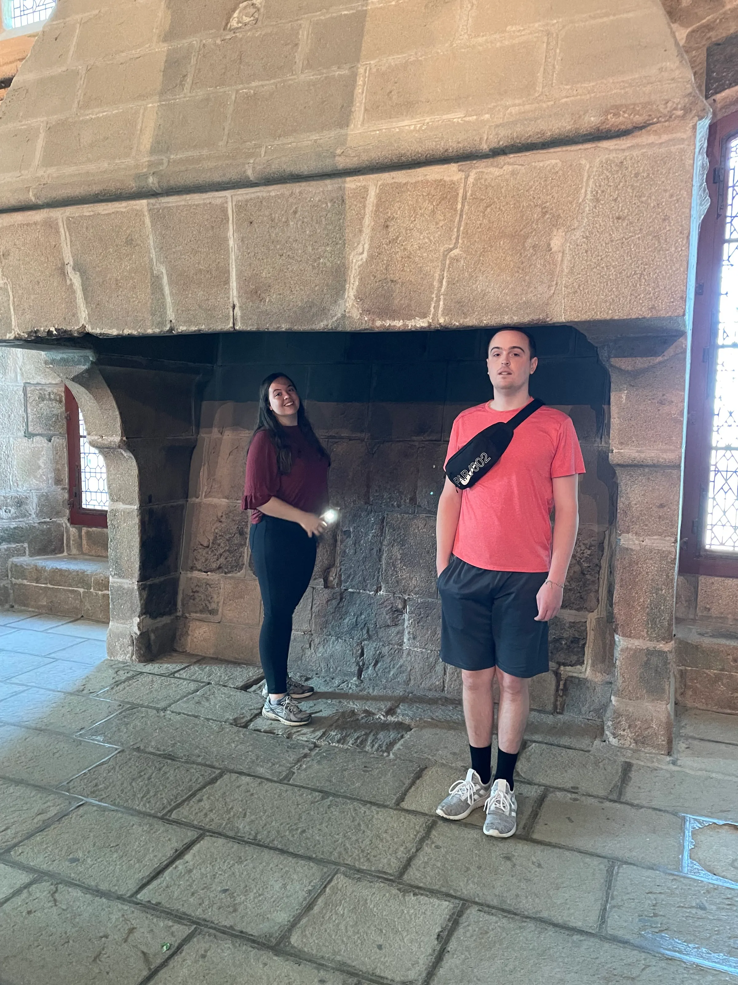 Josh and Riley in the fireplace at one of the rooms in LMSM.