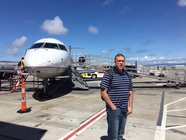 Started the trip well by leaving my coat in the airplane. First time I've disembarked out on to the Tarmac at SFO. I'm waiting for the coat to be retrieved.