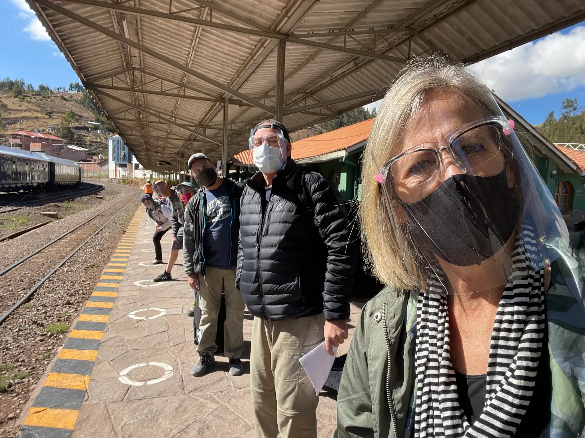 In line waiting to board our train, 6 feet separated, with face masks and face shields and we are all vaccinated. Amazing! I think I feel safe.
