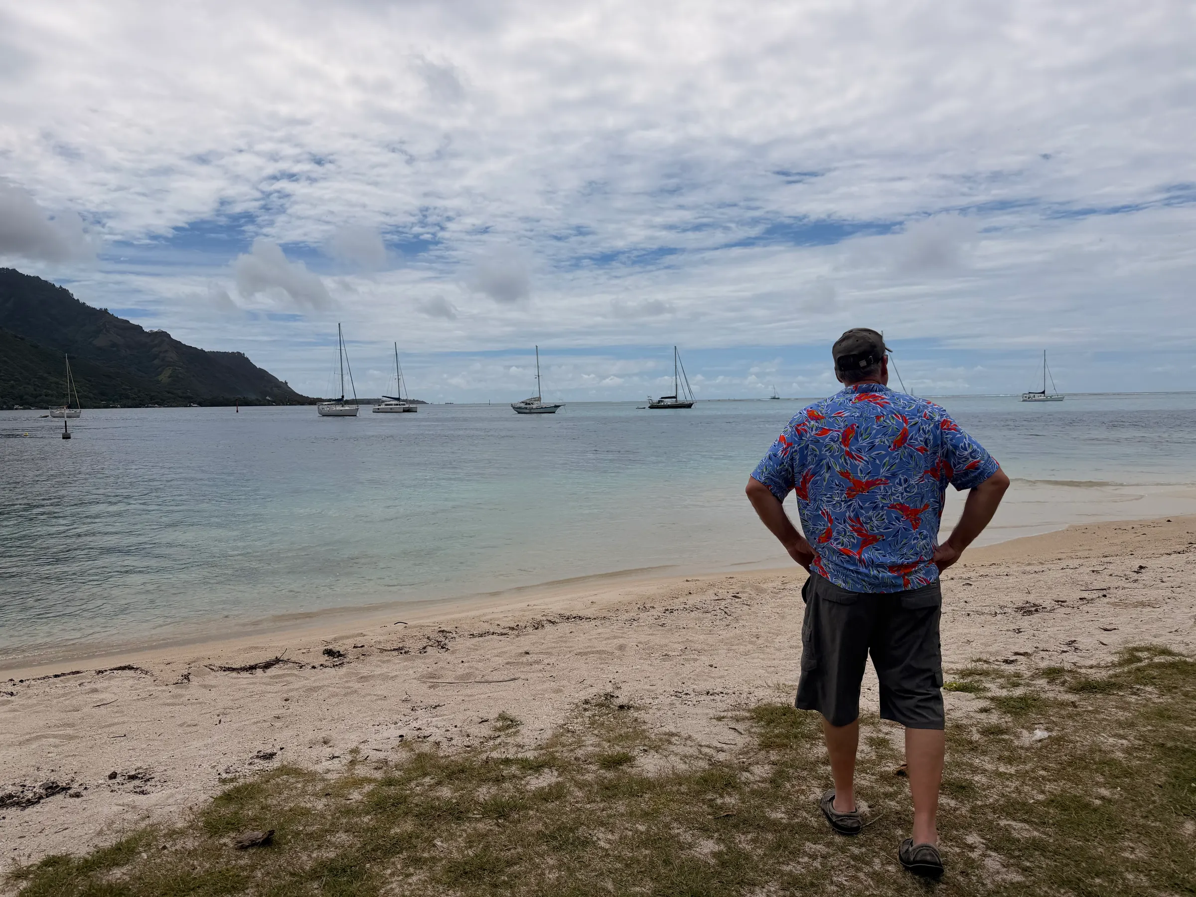 Me, wondering why I’m not out there swimming and snorkeling. This was a different beach a bit further north. I forget the name.