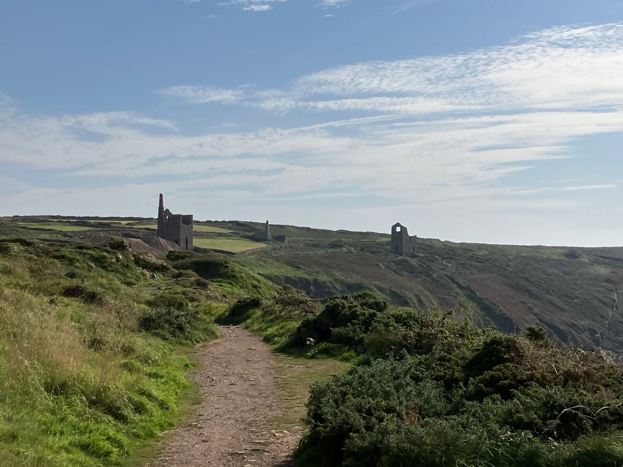 The landscape in this area is dotted with ruined mines from a long time ago. They all had a stack that rose up from the ground to vent bad gases.
