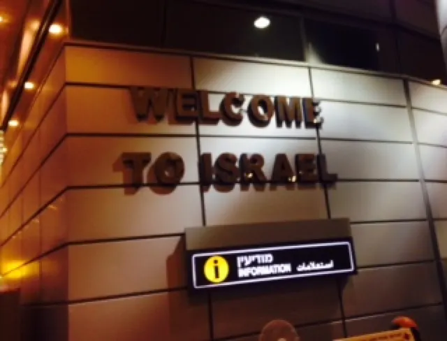 Welcome to Israel sign. Notice three languages...on all signs....Hebrew, Arabic and English.