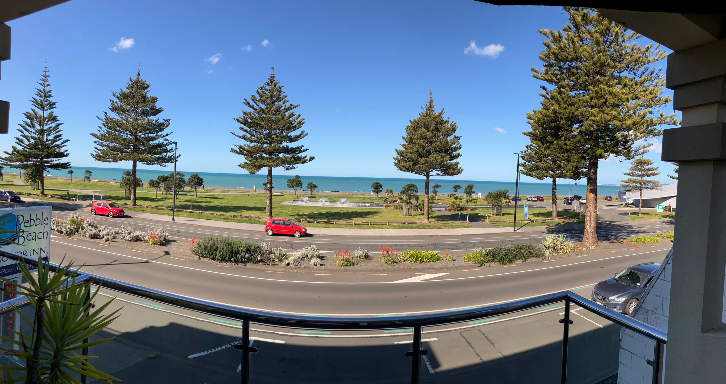 This is our view overlooking a park and then the beach and sea.