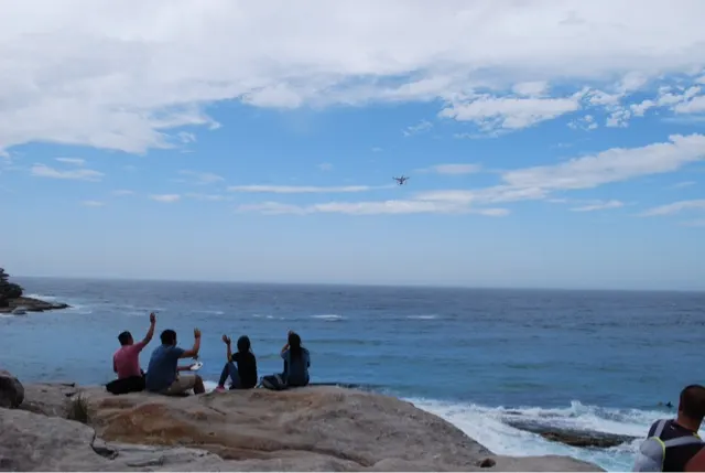 At one point, there was a family who had a drone. You can see it in the air. They are waving to it as it was getting pictures. Then that guy sent that drone so far out to sea...you could not see it...it was so far. I was amazed by it. So darn cool!!!!