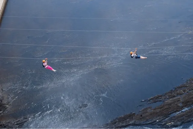 There they go across the deep gorge....