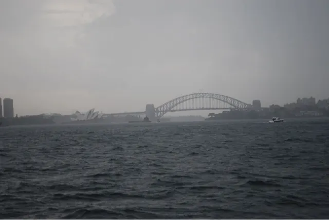 With rain coming down, I still got to the front of the Ferry to grasp a picture of the bridge and the Opera House. I wish it was a blue sky day. We're hoping for some sunshine tomorrow.