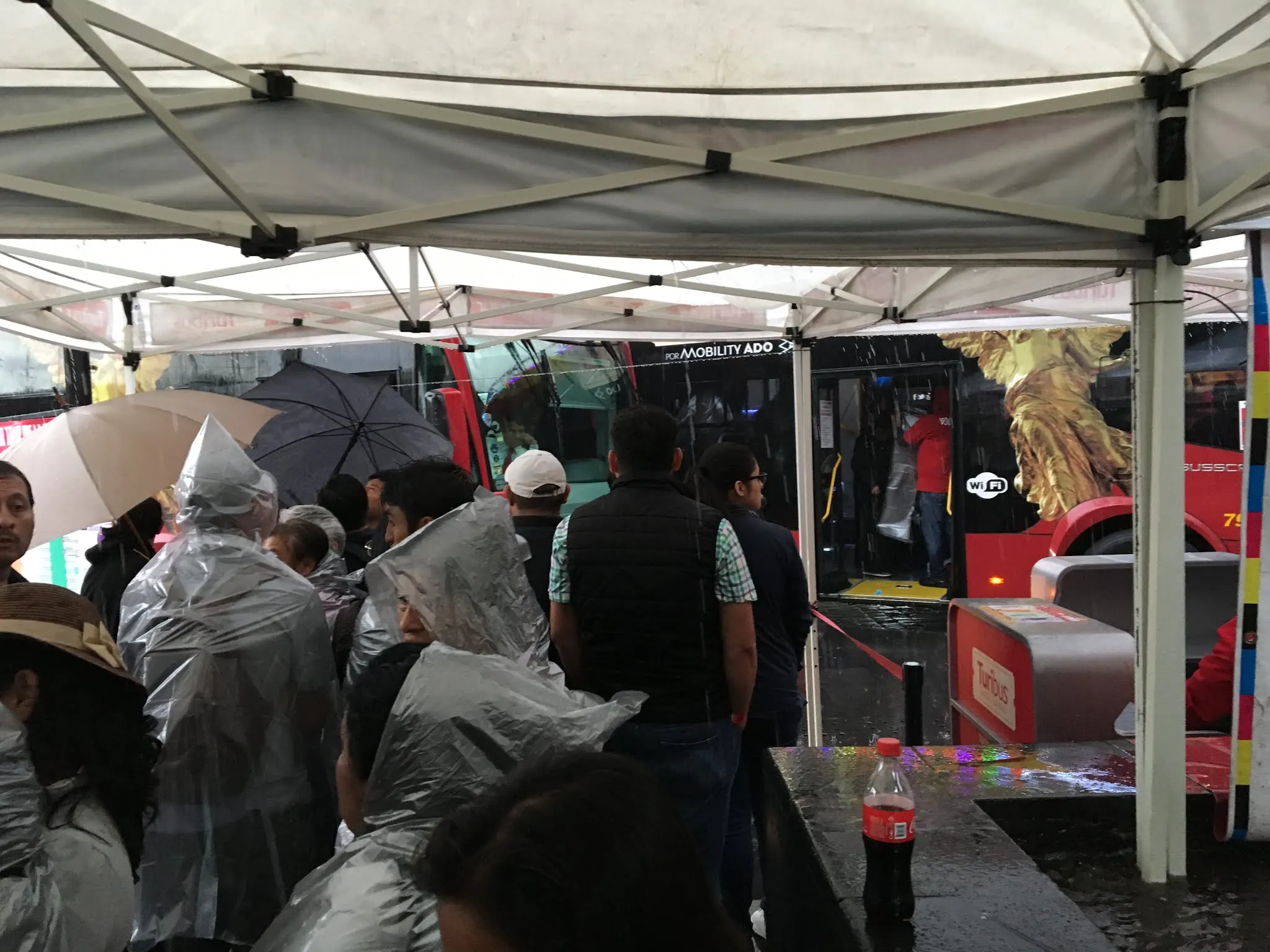 Huddling under canopy’s as the rain came a tumbling down.....