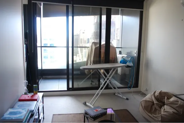 The living room, balcony and entrance to our hosts bedroom....