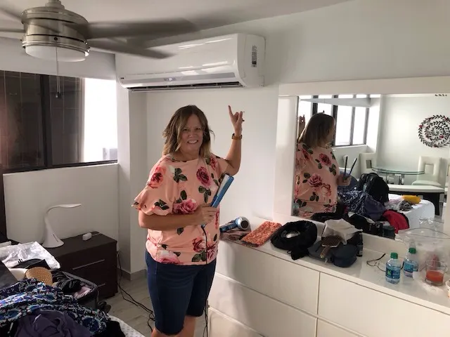 Denise happy to do her hair under the cooler....they knew she would need that!