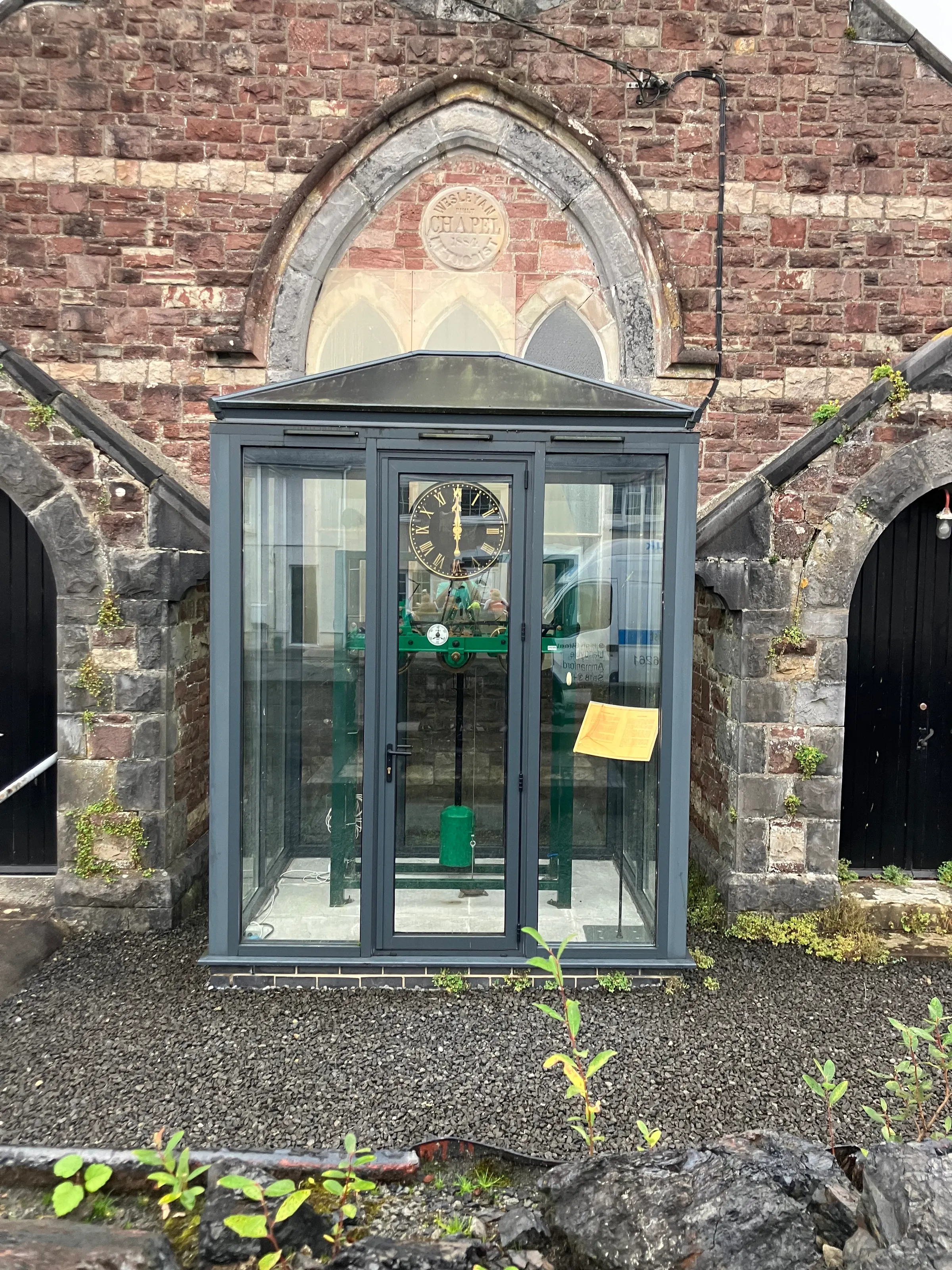 Interesting clock in front of a little church on our path to the market.