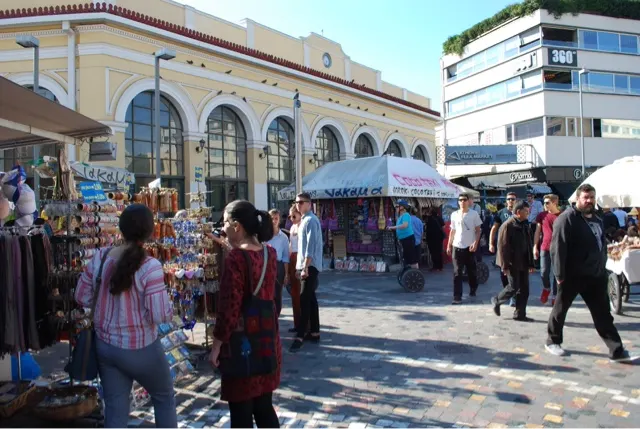 This is a central plaza where the train station is found (yellow building).