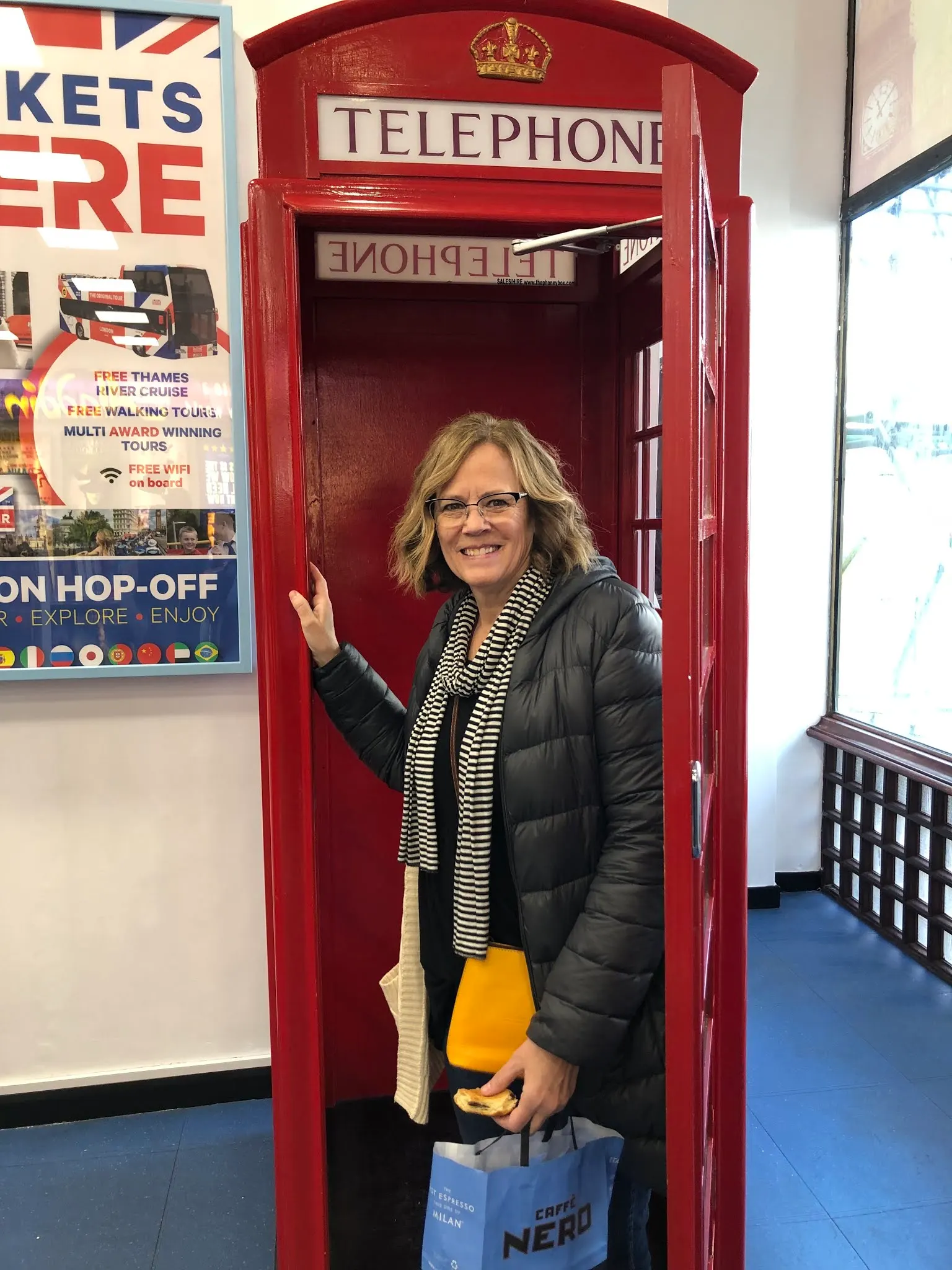 Denise in telephone booth