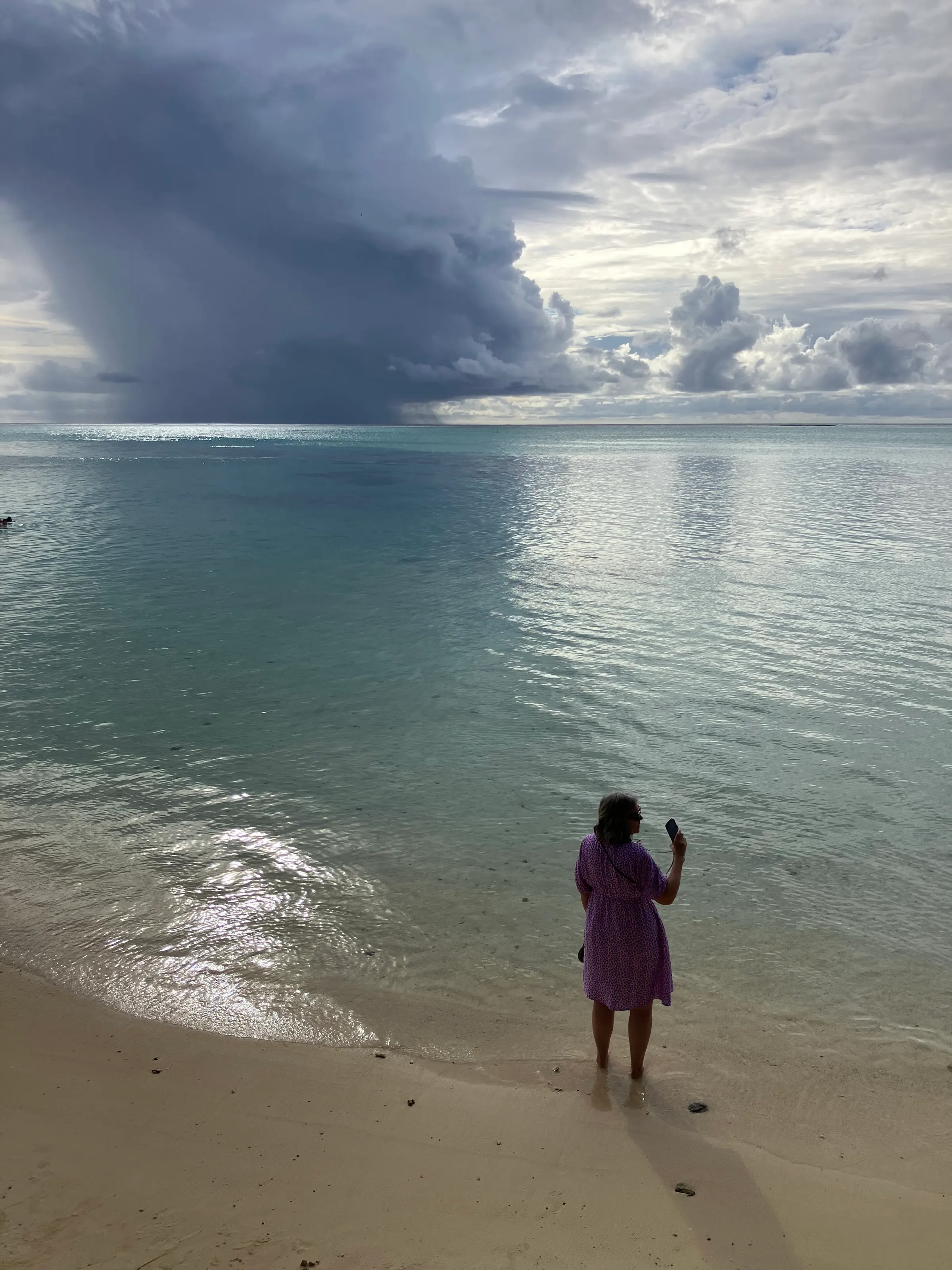 I loved that cloud burst that was going on out in the sea. But adding Denise to it made the shot even more amazing.
