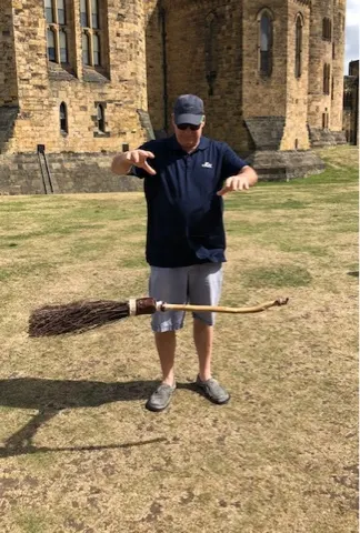 This is me starting my take off on my broom. I had to hurry so I could coach Denise on how to get her broom to levitate and eventually fly her broom.
