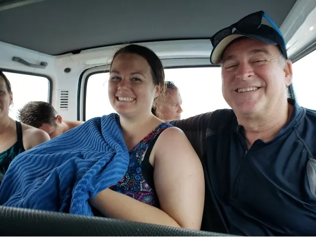 Karlie and I crammed into the van to go back to the ship....