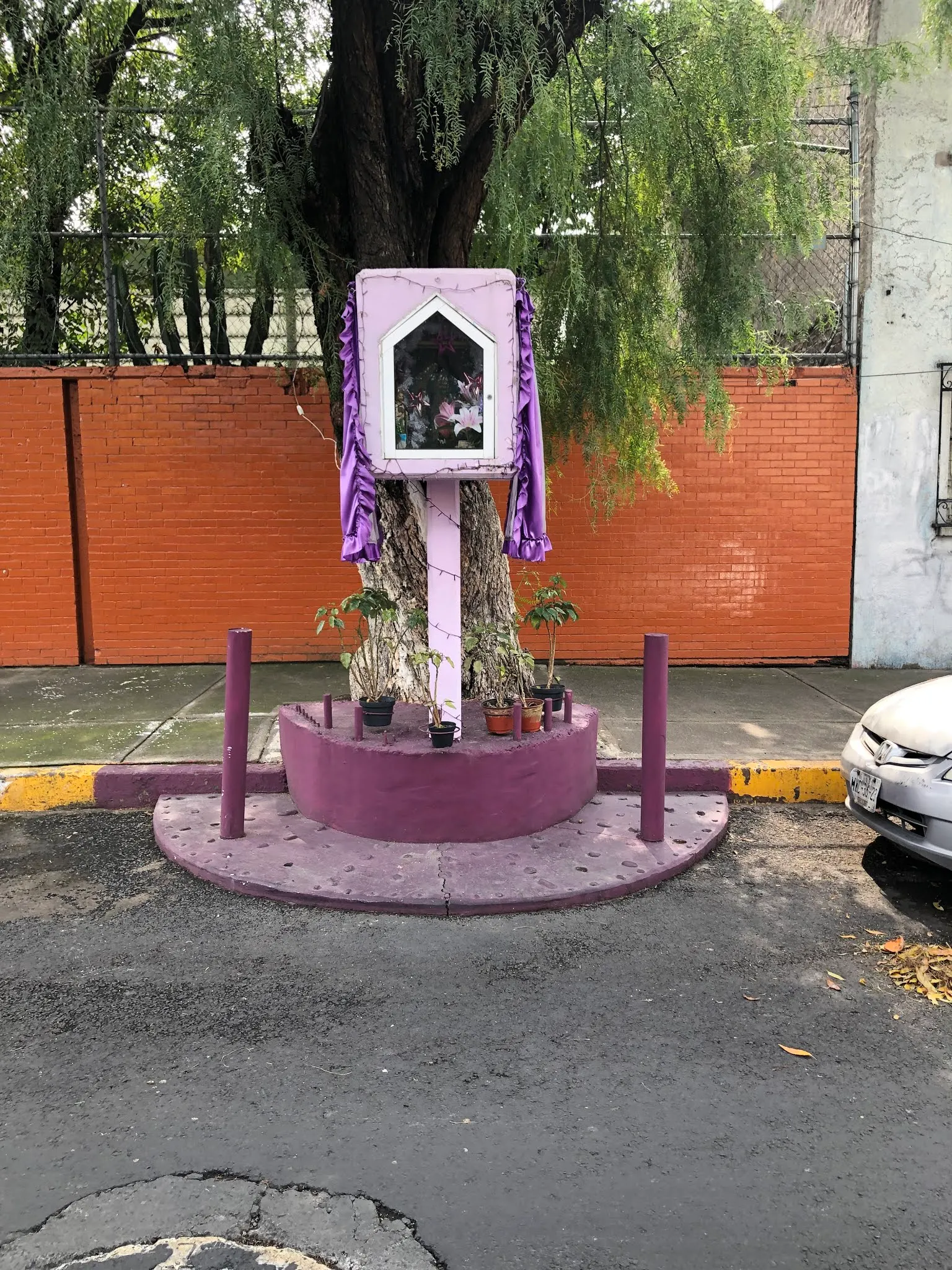 They have these on every street where people place religious items. I guess there is a day each year for each street when they have a celebration to whatever saint they are making their offerings to.