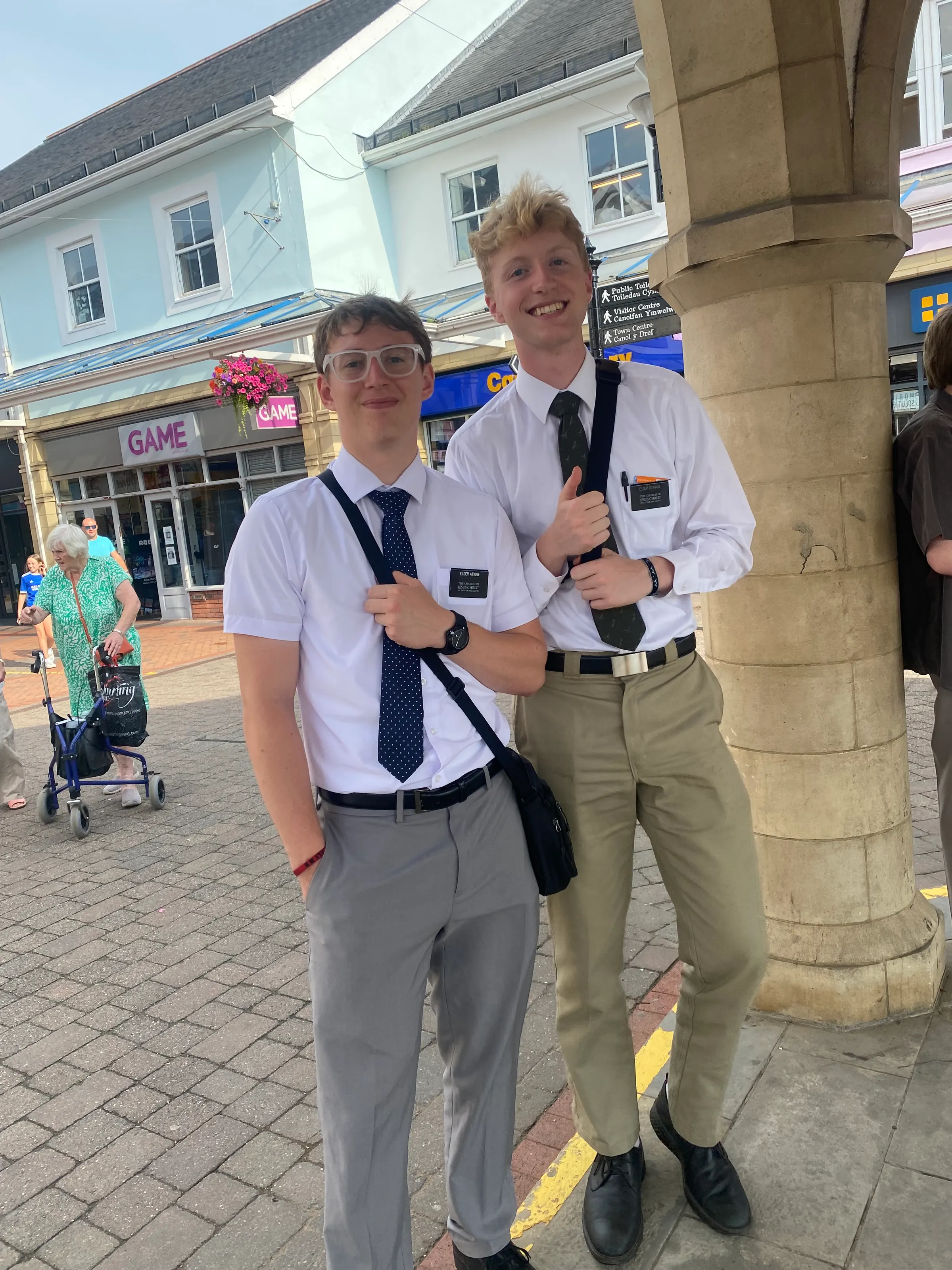 We stumbled on 2 missionaries who were there with a friend who was supporting a friend who was playing a guitar and singing in the square where the race was ending. I think they just wanted to see the race if you ask me!