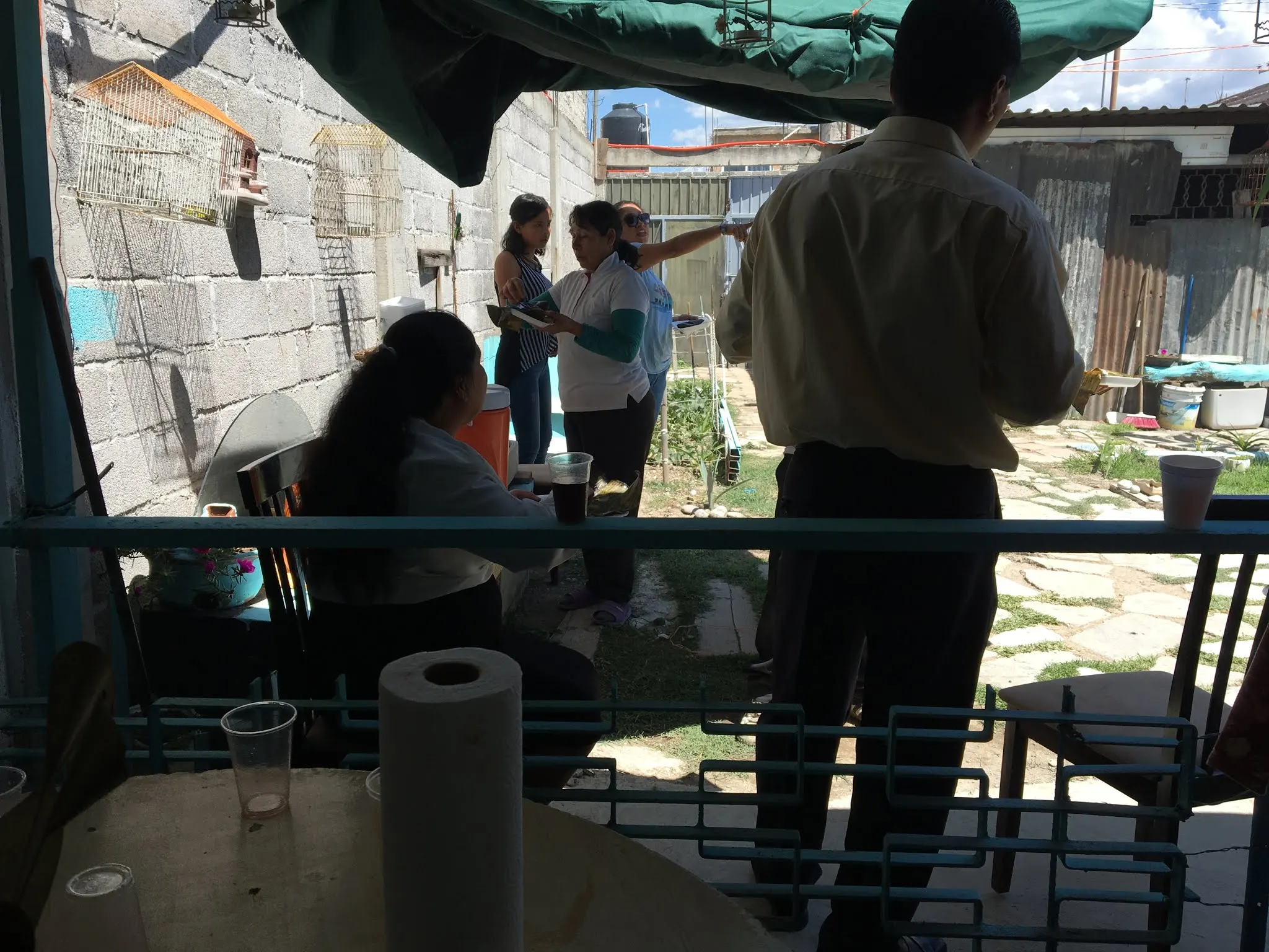 You can see the entrance to their place in the far back. You pass a small building and a little garden and into a court yard. They tied up the material overhead to provide shade while we were there.