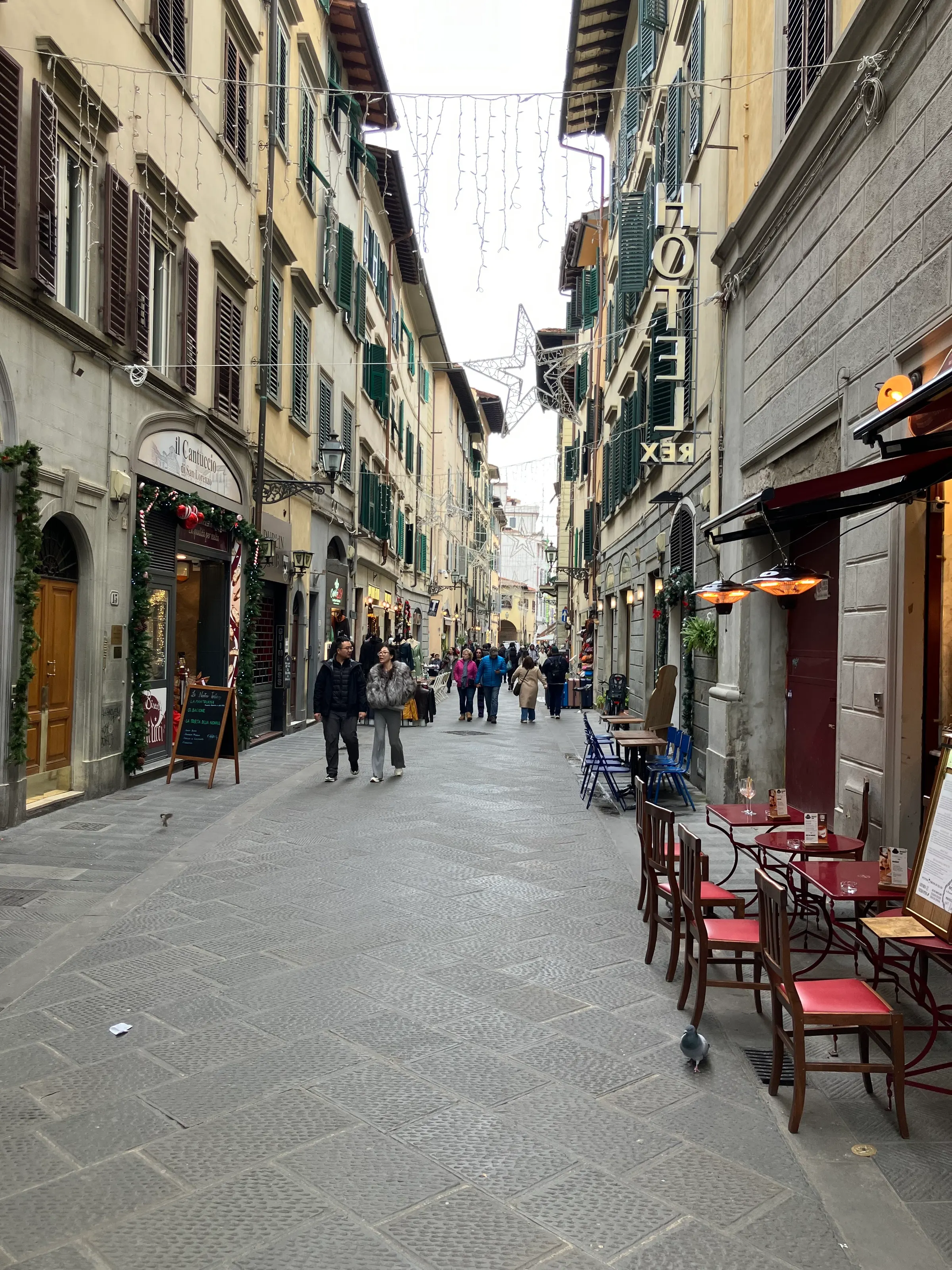 Our hotel is found on this narrow street I believe.