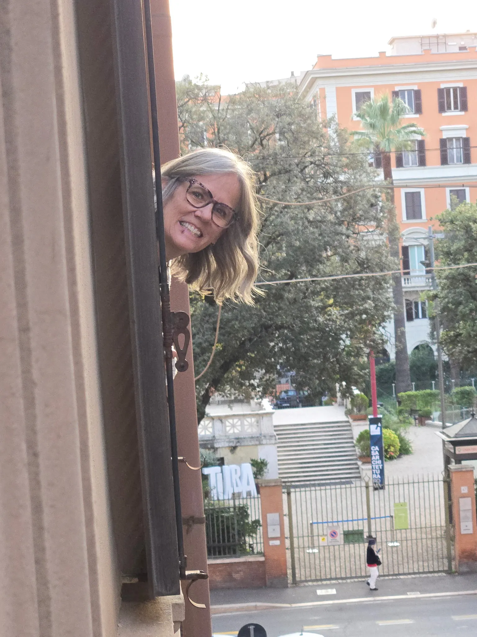 When everyone was back at the flat, we had a little fun. Denise and Michelle dangled themselves outside our windows just to get a photograph of each other. They could have died for just a photograph!