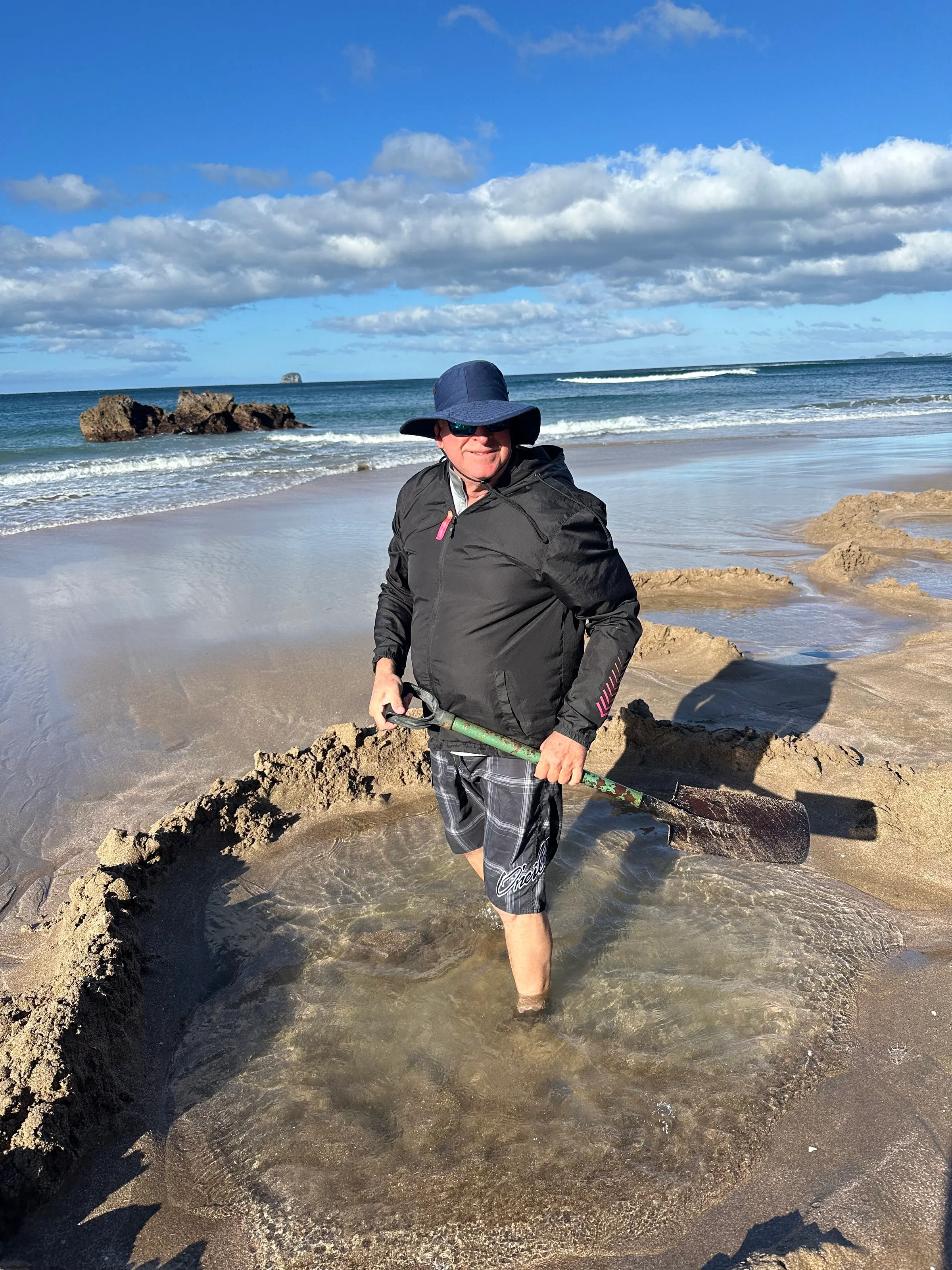 Digging our hot tub! You had to dig a lot to get a little down as the sand just kept flowing in or up from the bottom. It was weird.