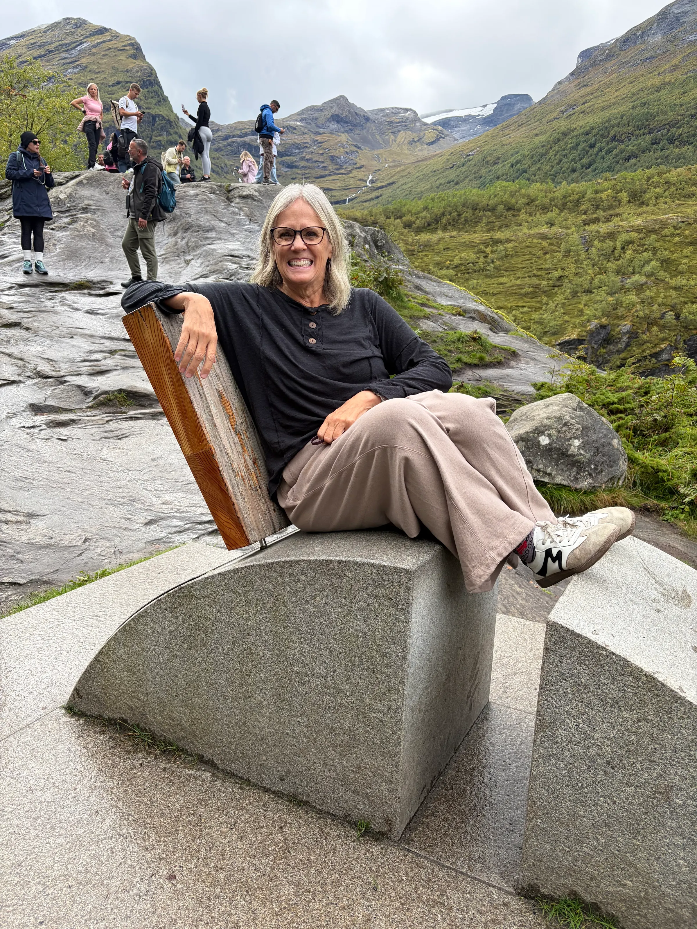 At the highest stop point of our on-off bus, there was this chair looking out over the valley. Denise and Ilene had some fun with it.