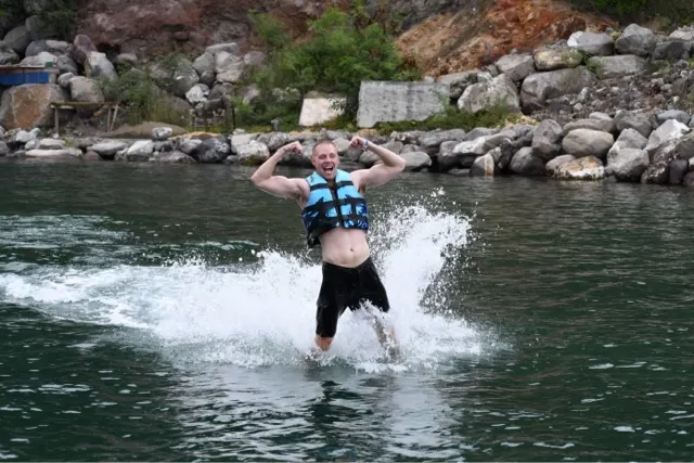 Acrobatic Brent. How cool is that...being pushed by Dolphins!