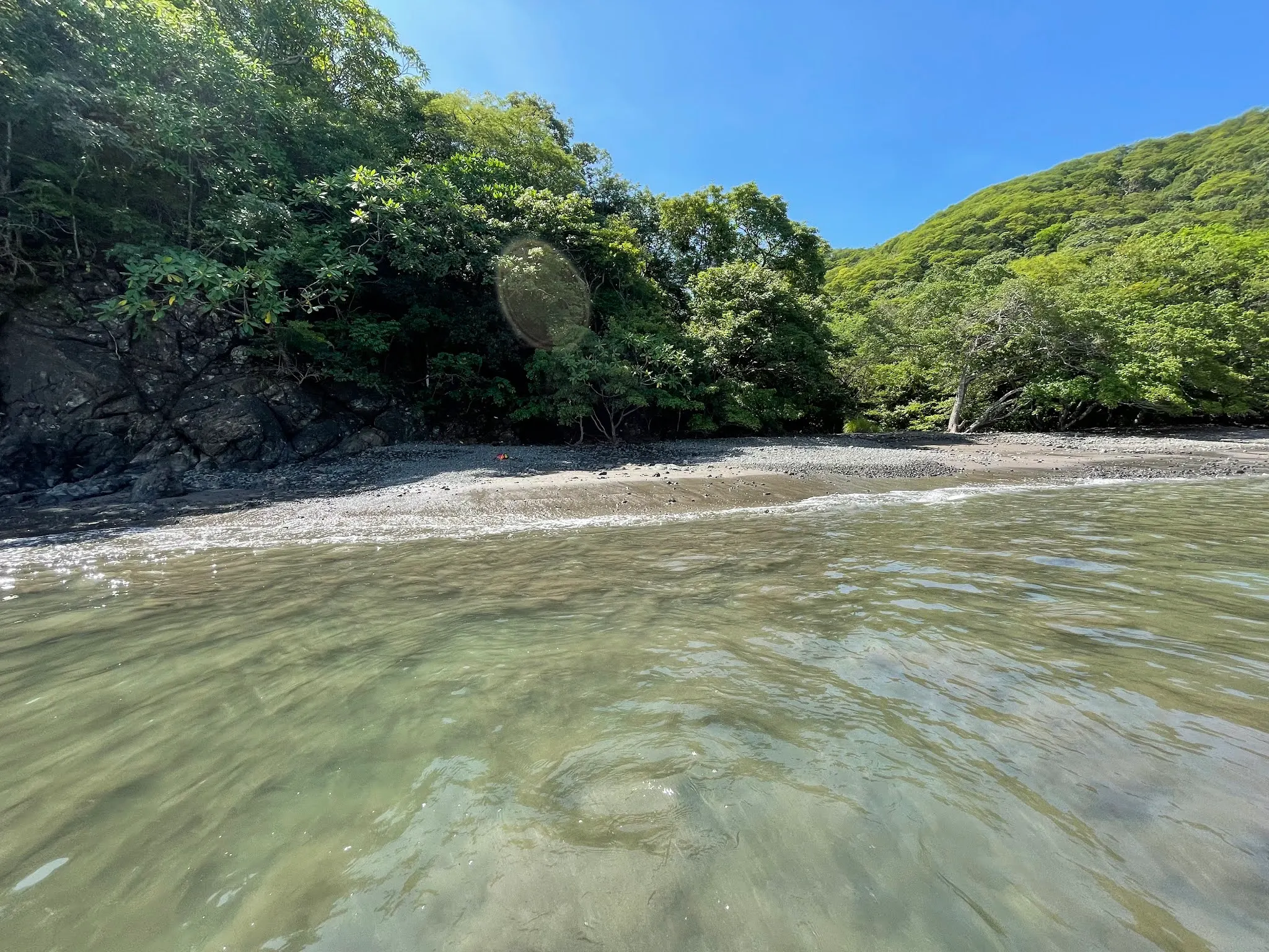 Our cove where we swam in the morning with not one around. Well…one girl came down by herself and swam around. But that was it. Nice morning at Playa Hermosa.