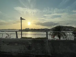 If you look across the water to the white building on the point of the land, that is where Denise had her hat blow off her head and down to the waters edge. The water was out so it landed on dry ground. It was a nice experience of people being kind.