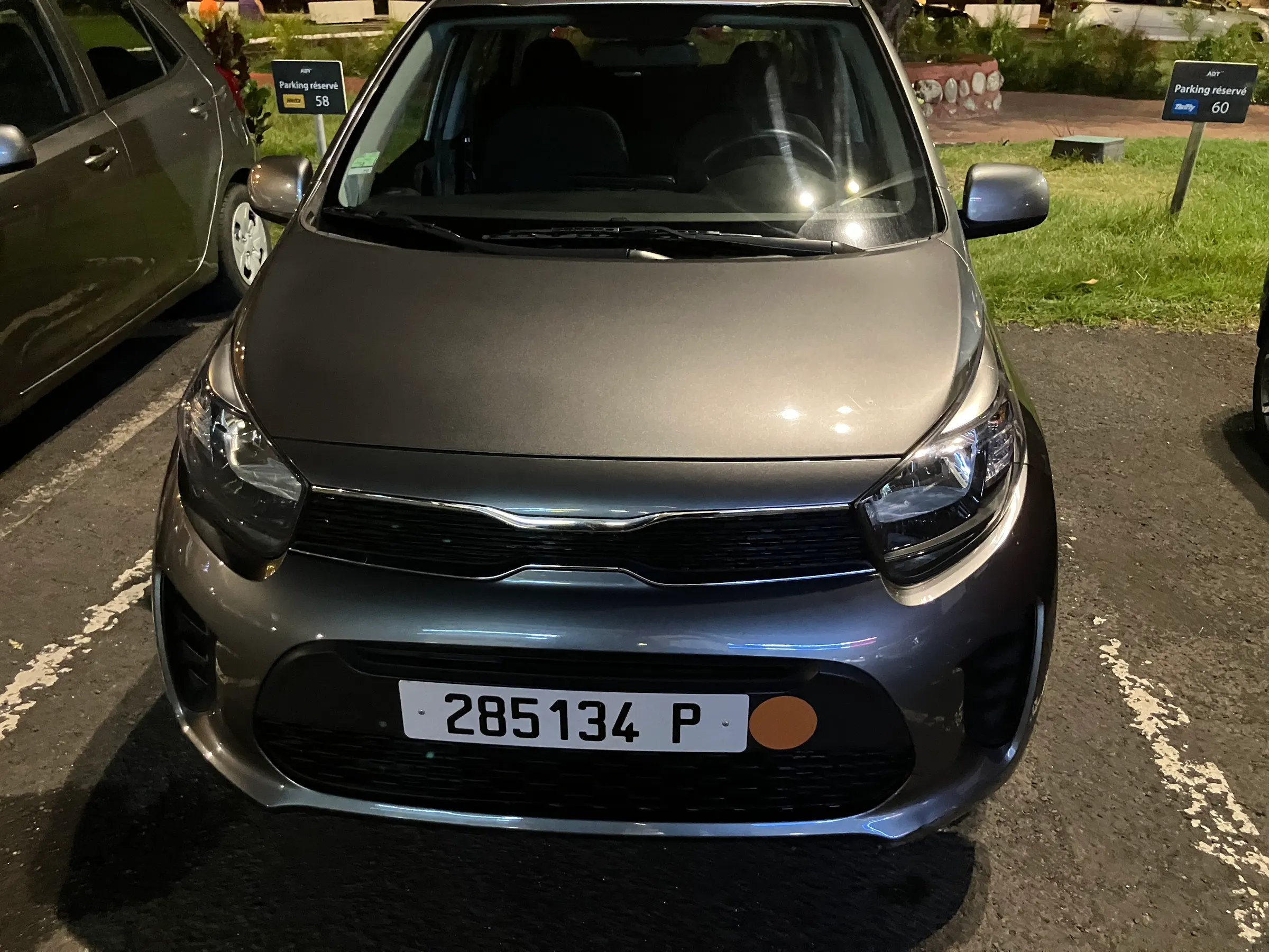 A picture of our rental car. I took many for insurance sake. Small…but all we need. And since we are taking it on a ferry to Moorea today, it is a bit cheaper.