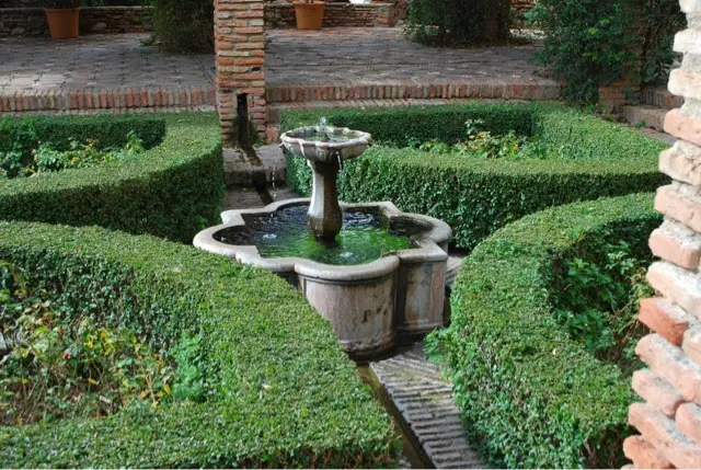 One of the fountains in a garden area in the Alcazar.