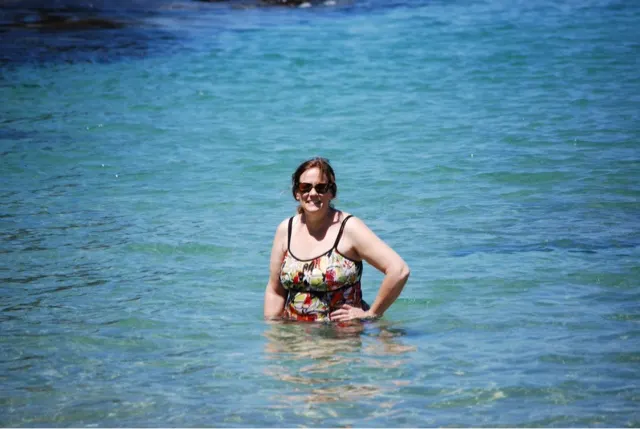 My beautiful wife enjoying the coolness of the water. It was a warm day. So the cool water felt really good...at least to me.