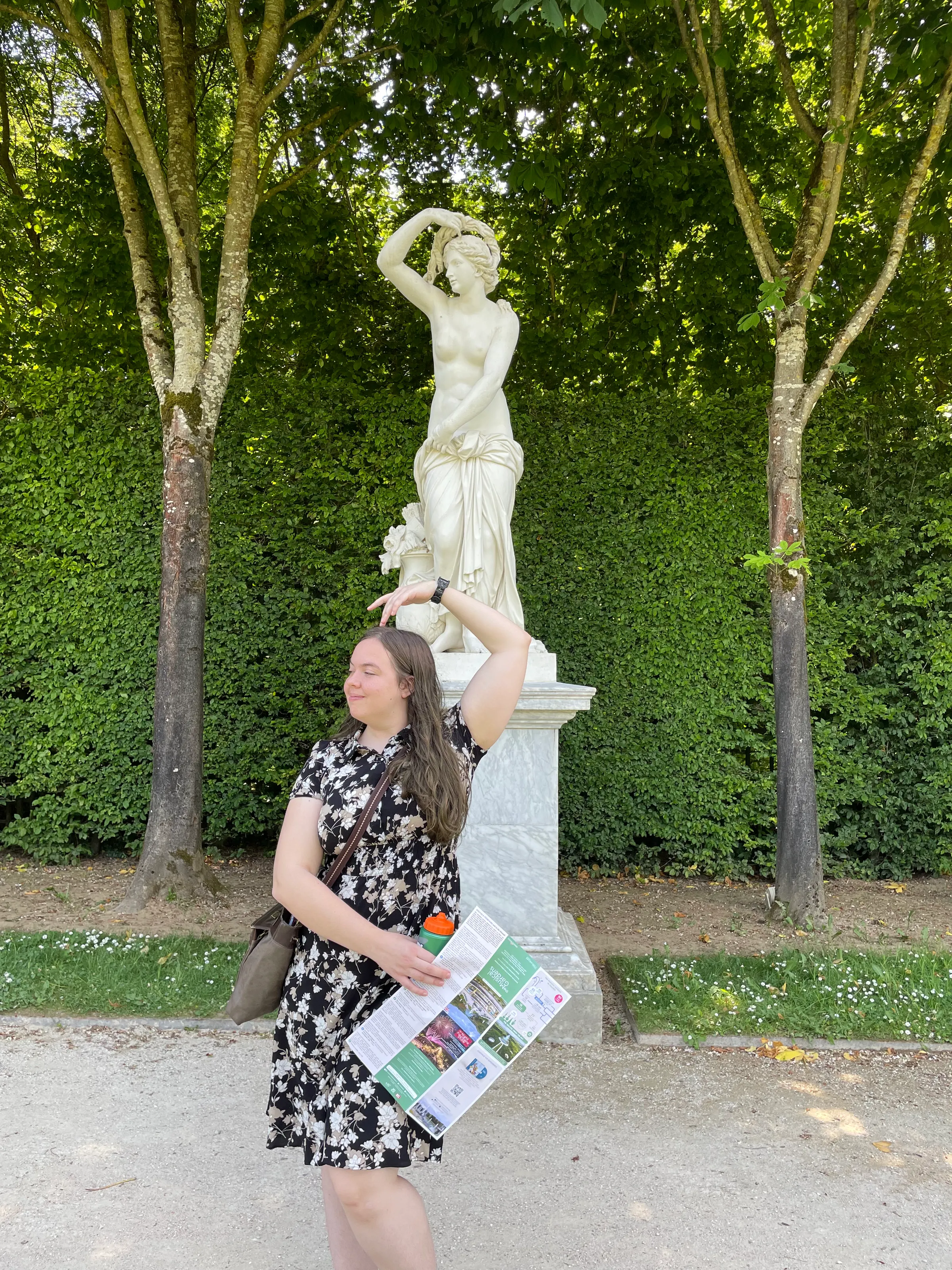 Riley trying to mimic the sculpture. I teased her about having her arms a bit different than the sculpture.