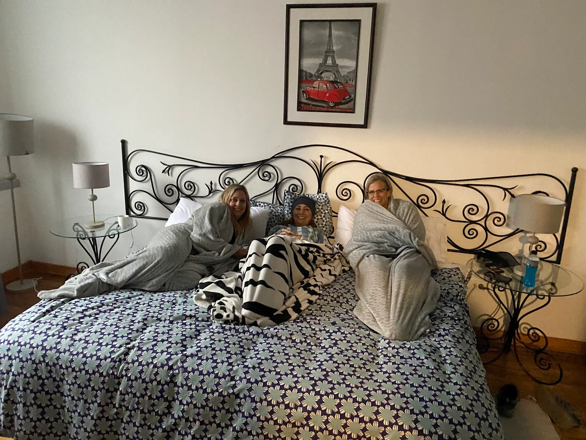 It got cold so the girls found blankets and huddled on one bed while we listened to the dreaded BYU game.