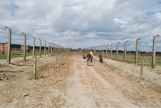 After they unloaded, they were evaluated to see if they were strong enough to work. If they were not, they were sent down this road to be 'sanitized' (gassed).