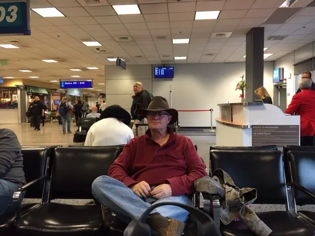 Indiana Jones is traveling with us (Steve Williams at SLC airport.)