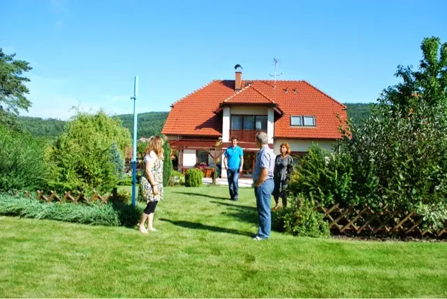 Back of their home...what a beautiful backyard it is.