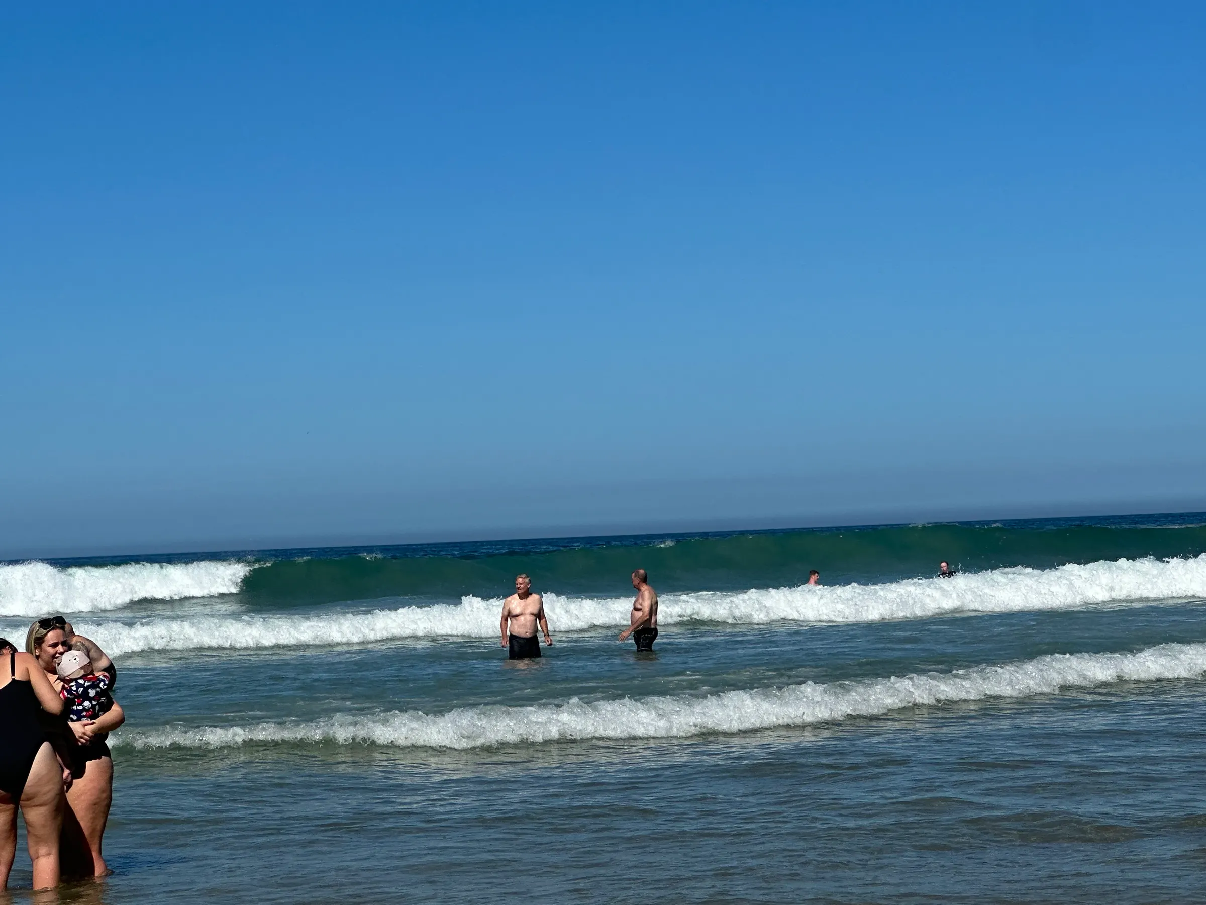 A couple of happy beach bums out in the water (Pat and I).