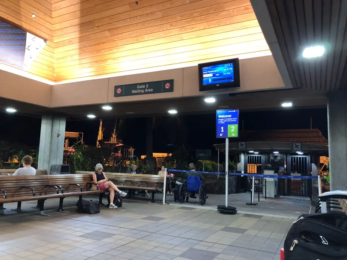 Outside waiting area at the airport. They have no inside waiting area. Pretty interesting...