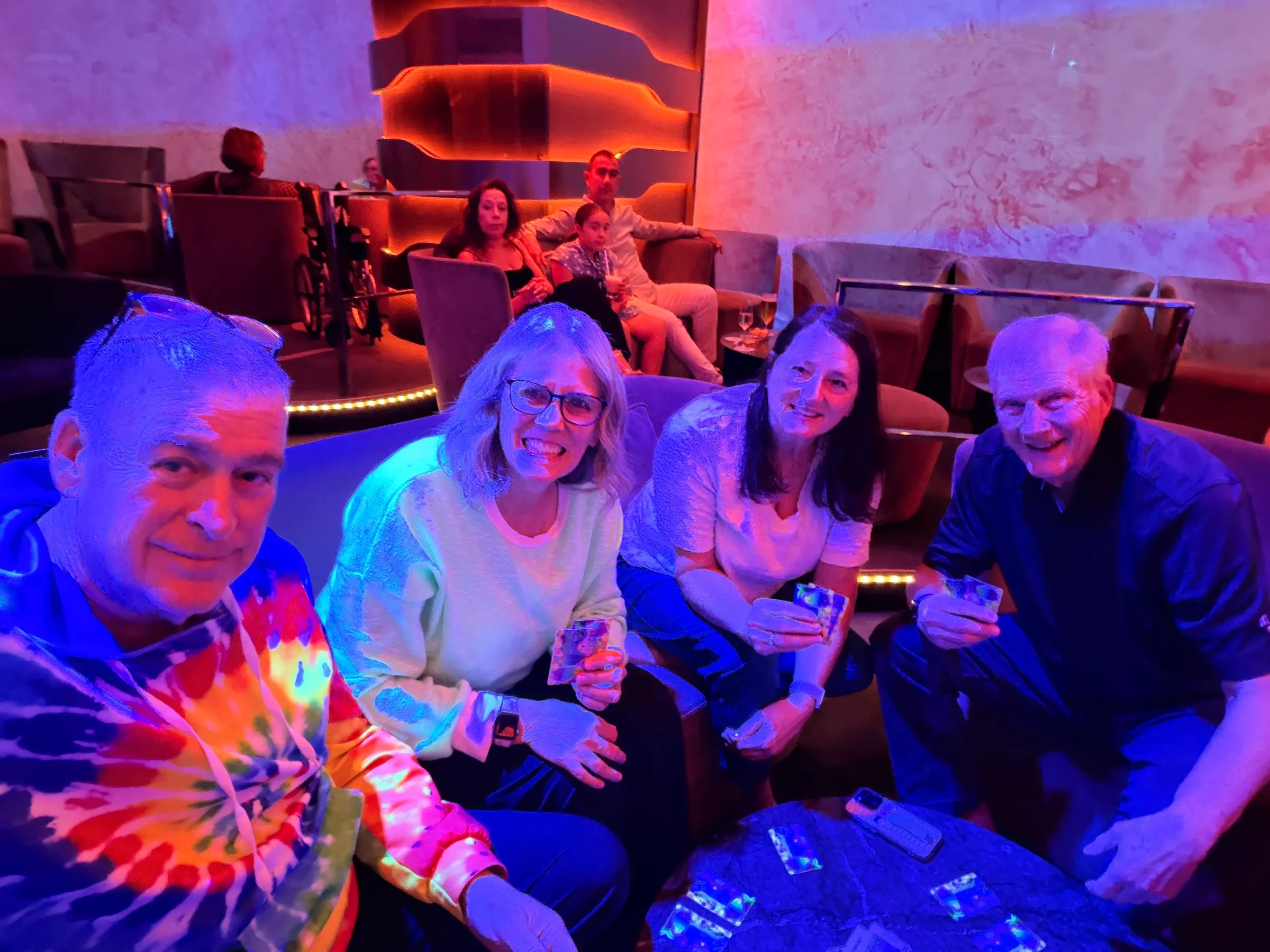 Playing cards while waiting for the big band show to begin.