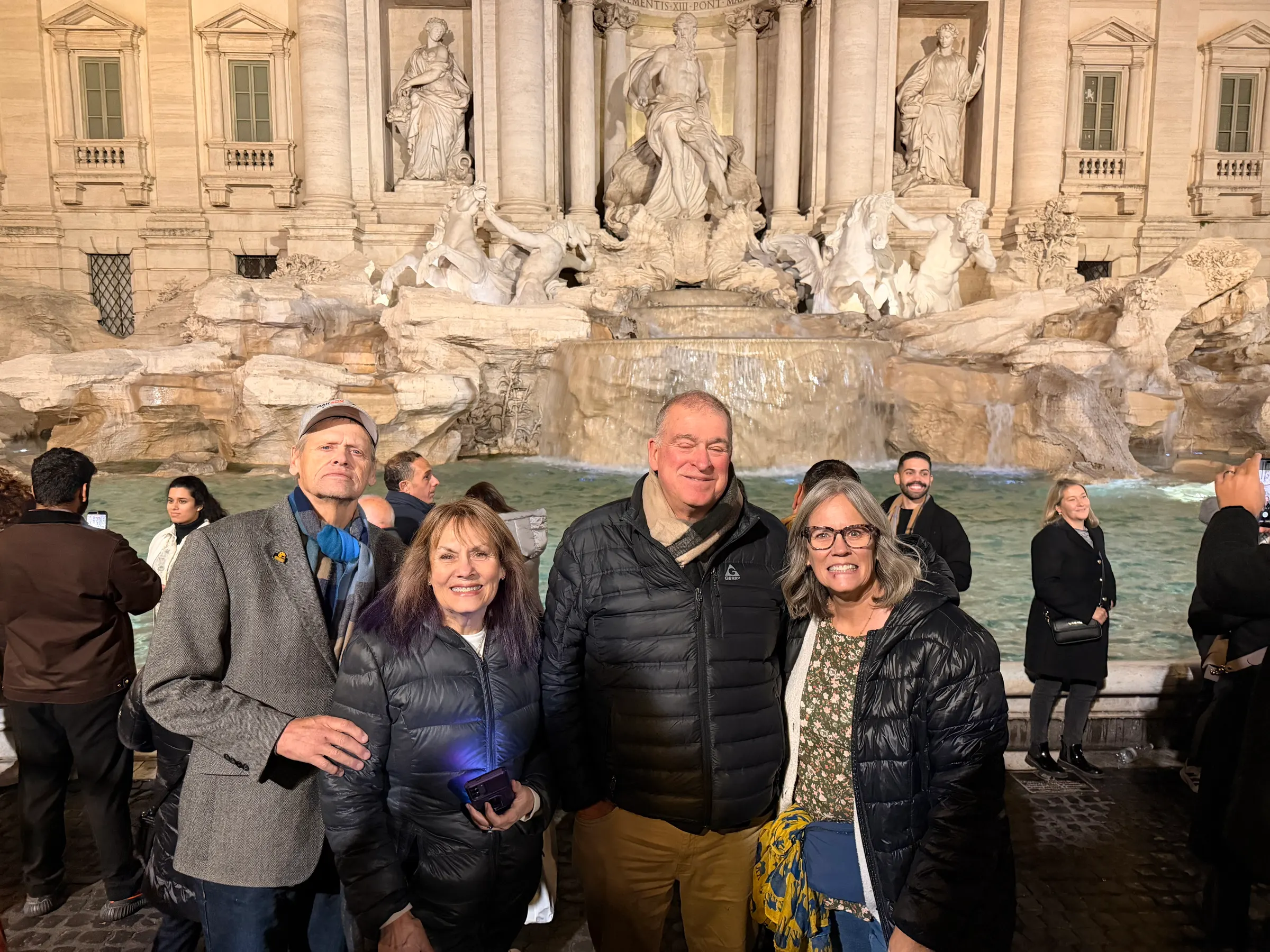 The group starting to enjoy Rome at the Trevi Fountain.